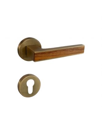 SICURO - Amr Helmy door handle with round rosette, Oxide