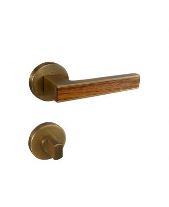 SICURO - Amr Helmy bathroom door handle with round rosette, Oxide