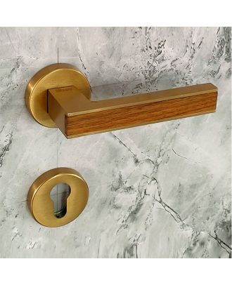 SICURO - Amr Helmy door handle with round rosette, Satin Gold